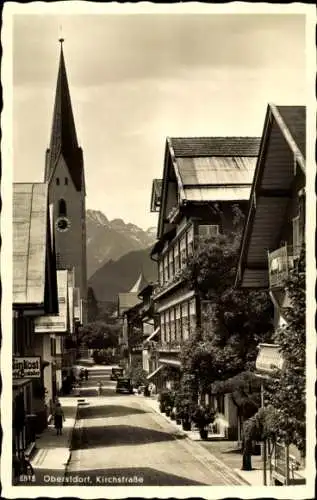 Ak Oberstdorf bayr. Allgäu, Kirchstraße mit Kirchturm