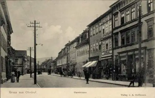 Ak Ohrdruf im Thüringischen Kreis Gotha, Marktstraße, Geschäfte, Passanten