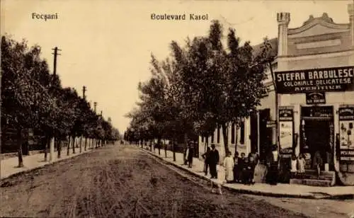 Ak Focșani Fokschan Rumänien, Boulevard Karol, Kolonialwaren Stefan Barbulescu