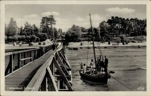 Ak Ostseebad Lubmin in Pommern, Seebrücke, Boot mit Kindern