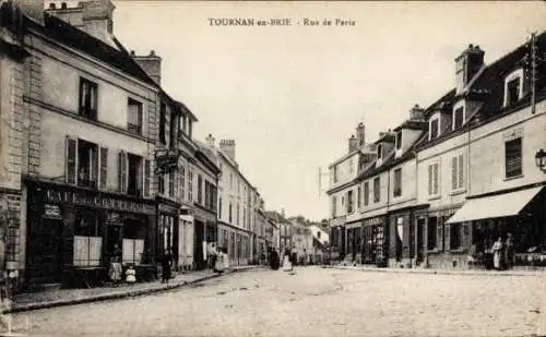 Ak Tournan en Brie Seine et Marne, Rue de Paris, Café