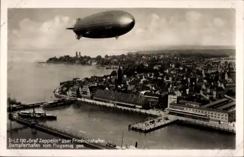 Ak Friedrichshafen am Bodensee, LZ 130 Graf Zeppelin, Dampferhafen, Fliegeraufnahme