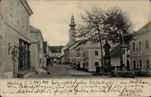 Ak Münzbach Oberösterreich, Straßenpartie, Brunnen