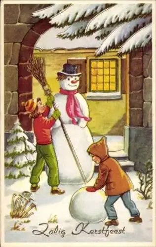Ak Glückwunsch Weihnachten, Kinder bauen einen Schneemann