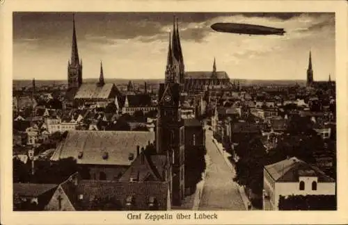 Ak Hansestadt Lübeck, Stadtansicht mit Luftschiff Graf Zeppelin