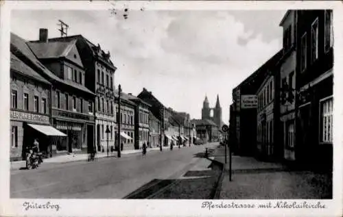 Ak Jüterbog, Pferdestraße mit Blick zur Nikolaikirche, Geschäft E. Böttcher