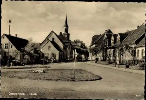 Ak Coswig in Anhalt, Flieth, Straßenansicht, Kirche