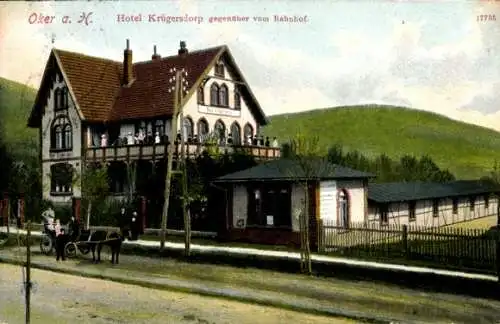 Ak Oker Goslar am Harz, Hotel Krügersdorp, gegenüber vom Bahnhof, Kutsche