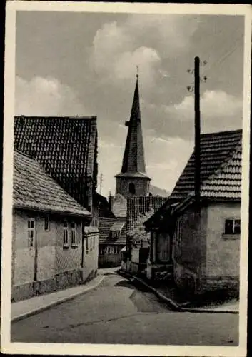 Ak Küllstedt im Eichsfeld, Gasse, Kirche