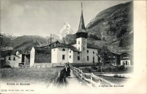 Ak Zermatt Kanton Wallis, Kirche, Straße, Frau