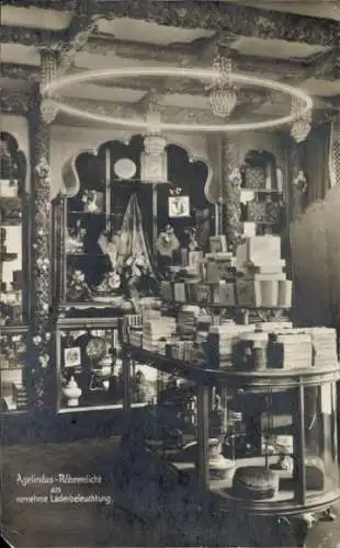 Ak Agelindus Röhrenlicht als vornehme Ladenbeleuchtung, Geschäft, Innenansicht