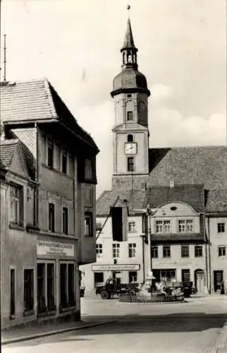 Ak Mügeln in Nordsachsen, Partie am Karl Marx Platz, Bank, Spielwarenverkauf, Friseur