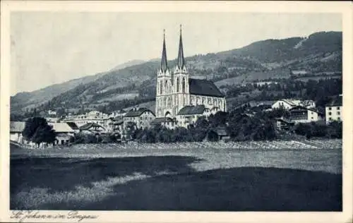 Ak Sankt Johann im Pongau Salzburg, Blick über Felder zum Ort mit Kirche