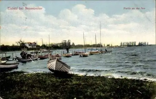 Ak Einfeld Neumünster in Holstein, Uferansicht, Boote