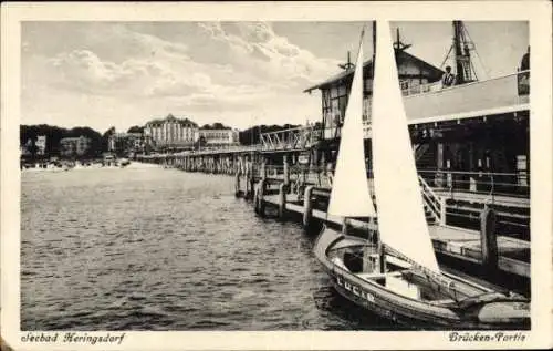 Ak Ostseebad Heringsdorf auf Usedom, Brücke, Steg, Segelboot Lucie