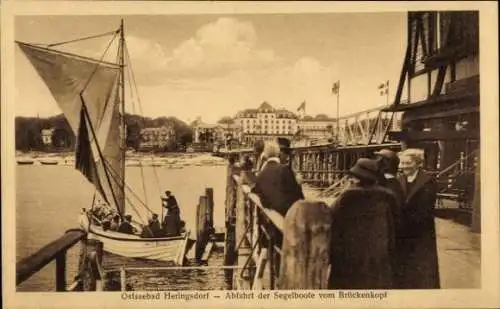 Ak Ostseebad Heringsdorf auf Usedom, Brückenkopf, Abfahrt der Segelboote