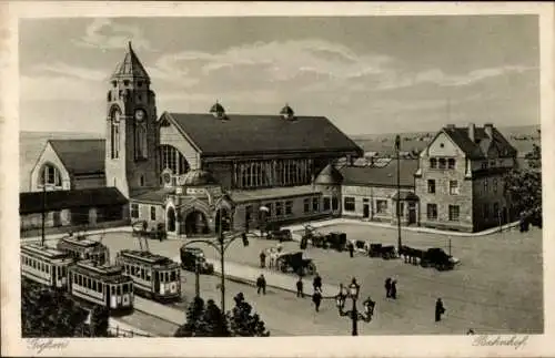 Ak Gießen an der Lahn Hessen, Bahnhof, Straßenbahnen