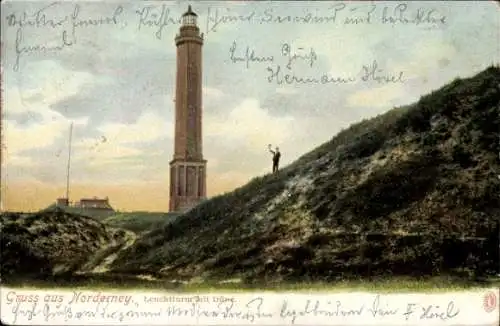 Ak Nordseebad Norderney Ostfriesland, Leuchtturm, Düne, Mann