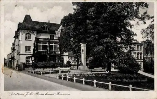 Ak Güstrow in Mecklenburg, John Brinckmann Brunnen