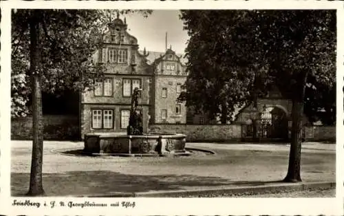 Ak Friedberg in Hessen, St. Georgsbrunnen mit Schloss