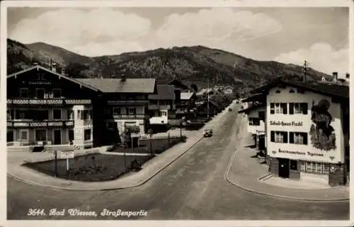 Ak Bad Wiessee Oberbayern, Straßenpartie, Schuhhaus Fischl, Bezirkssparkasse Tegernsee, Haus Ursula