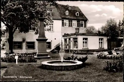 Ak Nastätten im Taunus, Adolfsplatz, Brunnen, Anlagen, Friseur Salon