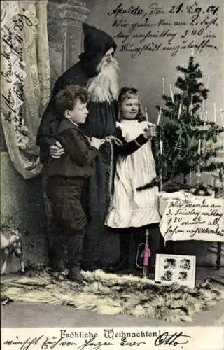 Ak Glückwunsch Weihnachten, Weihnachtsmann mit Kindern am Tannenbaum