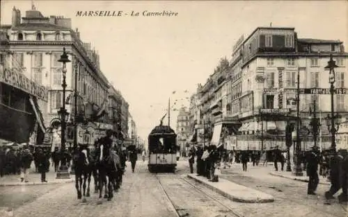 Ak Marseille Bouches du Rhône, La Cannebière, Straßenbahn, Reisebus