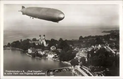 Ak Friedrichshafen am Bodensee, Luftschiff LZ 127 Graf Zeppelin, Fliegeraufnahme