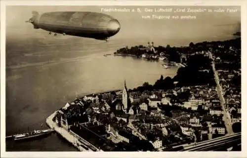 Ak Friedrichshafen am Bodensee, Luftschiff LZ 127 Graf Zeppelin in voller Fahrt, Fliegeraufnahme