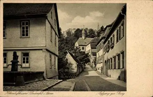 Ak Lindenfels im Odenwald, Straßenpartie mit Brunnen und Burg, Aufgang zur Burg