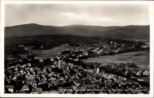 Ak Oberursel im Hochtaunuskreis Hessen, Fliegeraufnahme des Ortes mit Altkönig und großem Feldberg