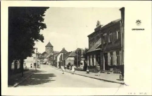 Ak Grevesmühlen in Mecklenburg, Straßenansicht mit Kirche