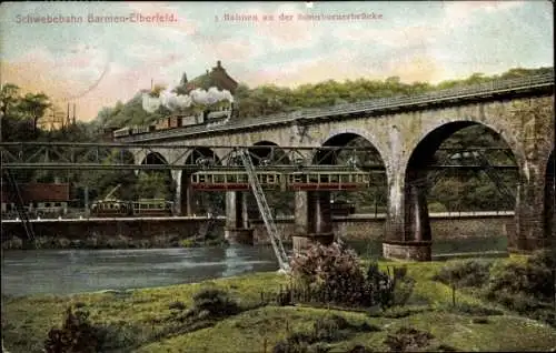 Ak Elberfeld Wuppertal, 3 Bahnen an der Sonnborner Brücke, Schwebebahn, Eisenbahn, Straßenbahn