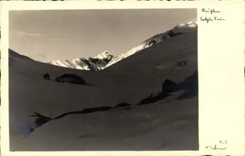 Ak Tirol Österreich, Blick auf Gebäude im Schnee