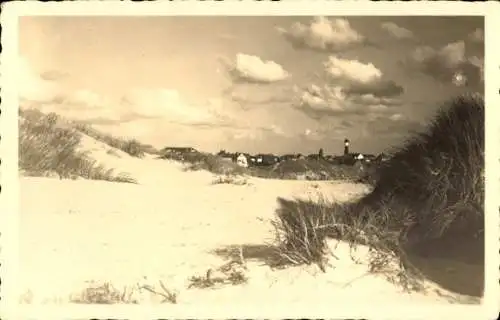 Foto Ak Ostseeküste Schleswig Holstein?, Dünen, Leuchtturm