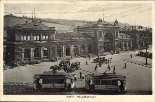 Ak Trier an der Mosel, Hauptbahnhof, Straßenbahnen, Kutschen