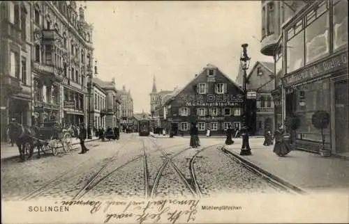 Ak Solingen im Bergischen Land, Mühlenplätzchen, Kaufhaus zur guten Quelle, Straßenbahn