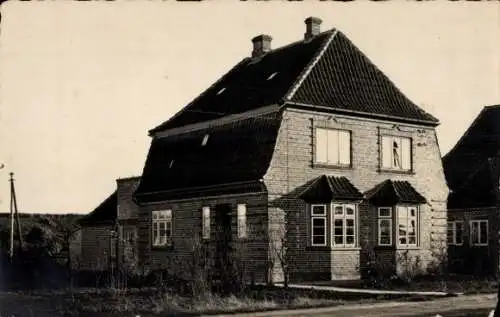 Foto Ak Brunsbüttelkoog Brunsbüttel in Dithmarschen, Wohnhaus, Straße, Oktober 1925