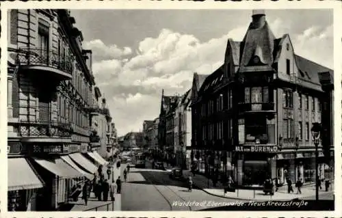 Ak Eberswalde, Neue Kreuzstraße, Geschäftshaus Max von Büren & Co., Straßenbahn