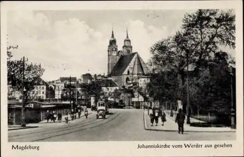 Ak Magdeburg an der Elbe, Johanniskirche vom Werder aus gesehen, Straßenbahn