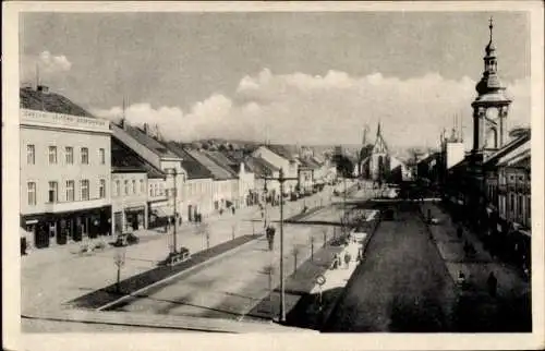 Ak Rakovnik Rakonitz Mittelböhmen, Straßenpartie, Kirche