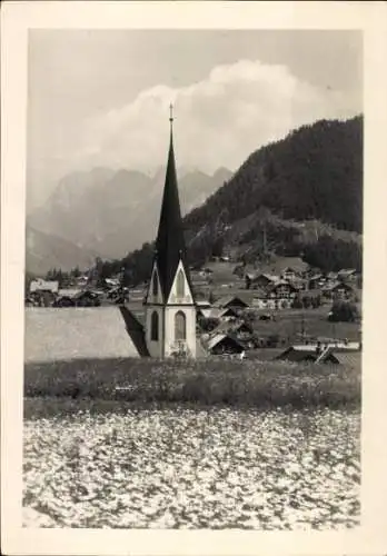 Ak Seefeld in Tirol, Teilansicht mit Kirche