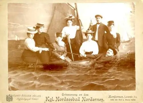 Foto Nordseebad Norderney Ostfriesland, Personen im Segelboot, Fotomontage