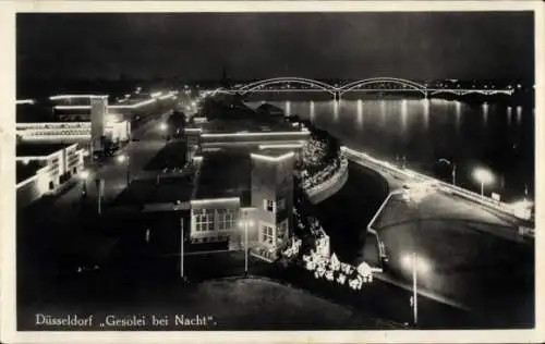 Ak Düsseldorf am Rhein, Gesolei bei Nacht, Rheinbrücke, Uferpartie