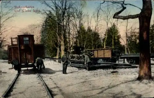 Ak Bahnarbeiten und Gleise legen, Winteransicht