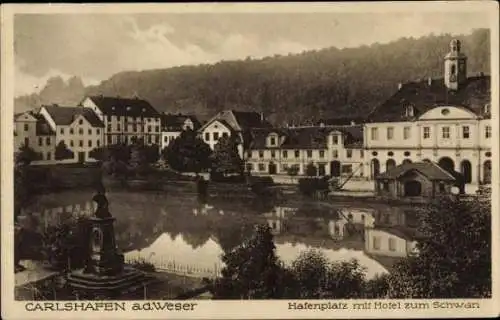 Ak Bad Karlshafen an der Weser, Hafenplatz, Hotel zum Schwan, Denkmal