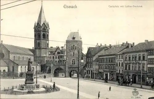 Ak Lutherstadt Eisenach in Thüringen, Carlsplatz mit Lutherdenkmal, Geschäfte