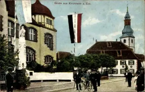 Ak Kirchheim an der Eck Kirchheim an der Weinstraße Pfalz, Straße, Flaggenschmuck, Denkmal