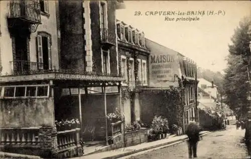 Ak Capvern Hautes Pyrénées, Rue principale, Maison Mourardou